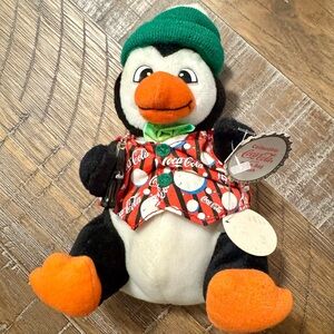 Coca-Cola Penguin Plush with Green Hat has Stain